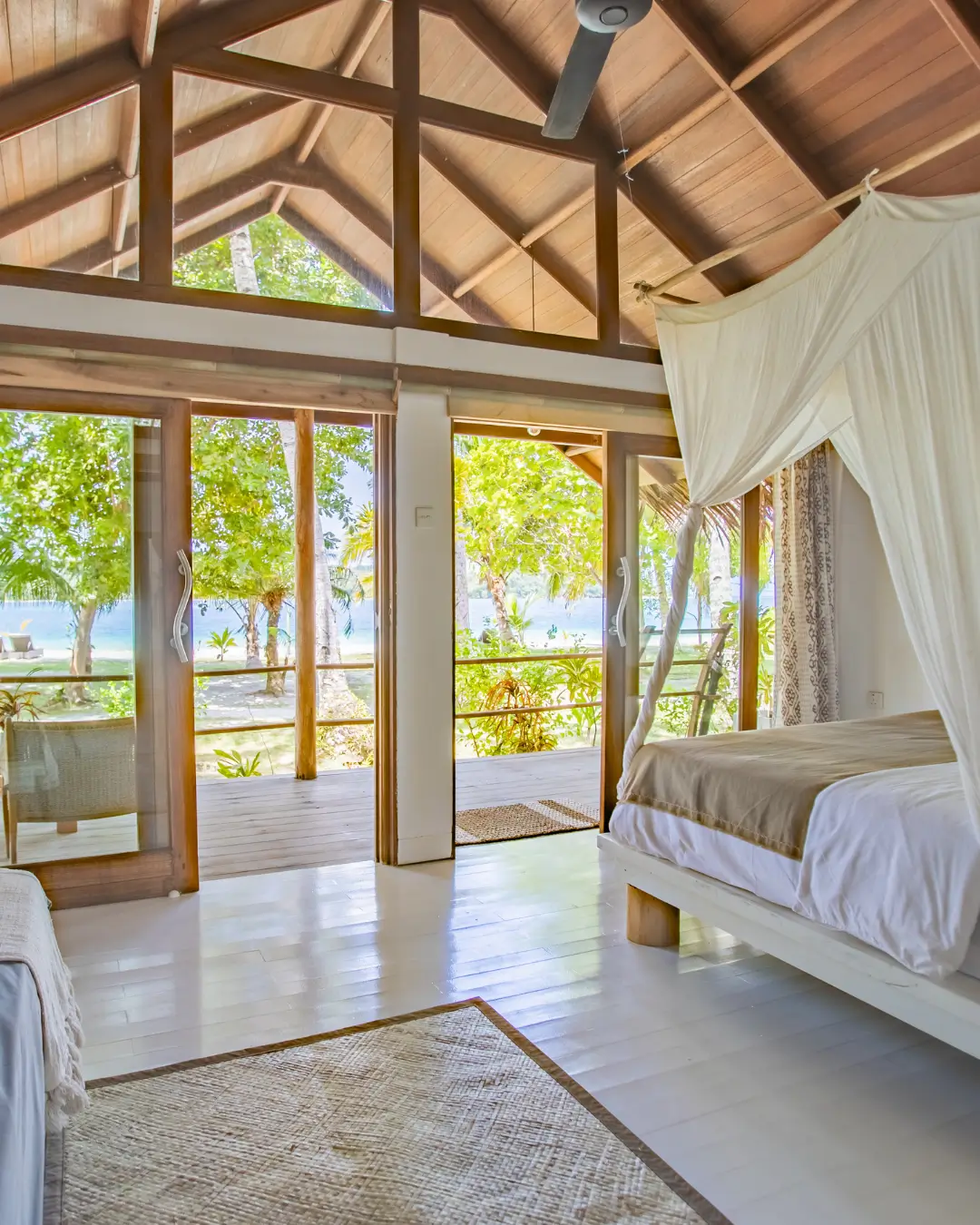 one bedroom villa aloita - at the right corner you can see a small par of the bed and in front is the view to the beach