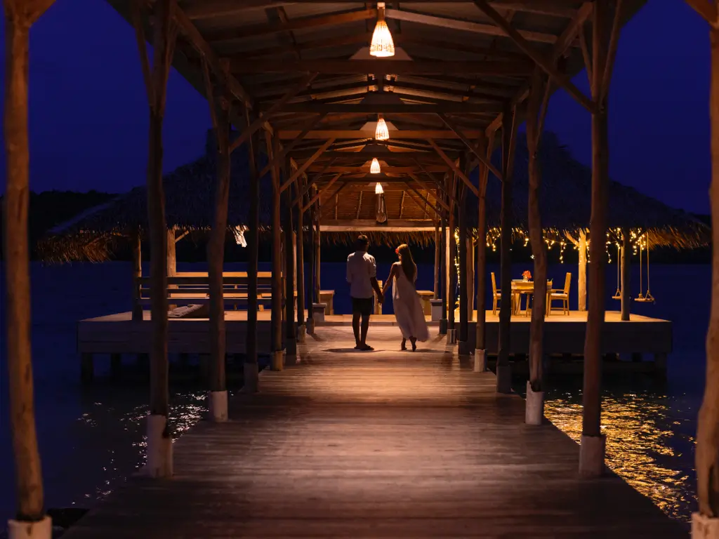 relax in mentawai with a romantic dinner at the jetty